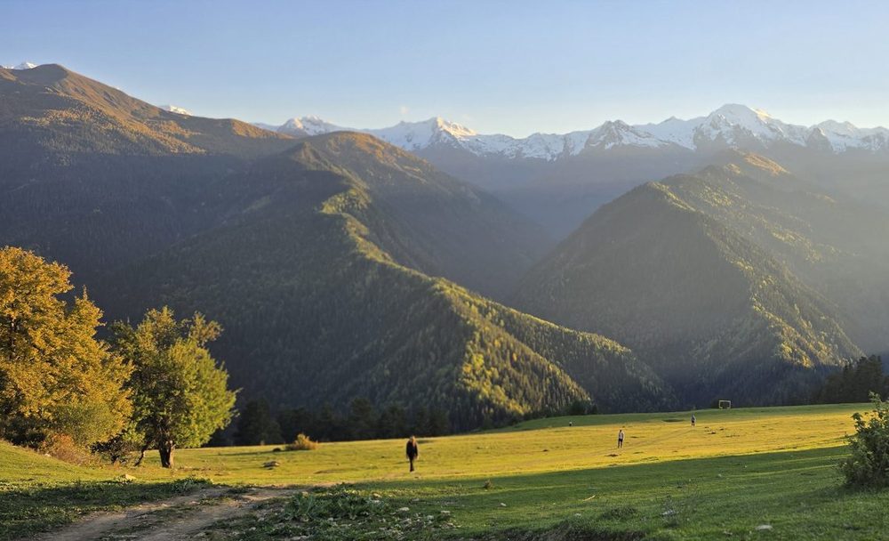 Wide alpine valley in Svaneti with mountain views on the walk from Etseri to Mazeri