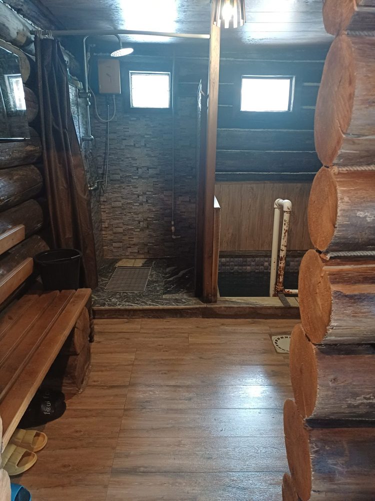 Traditional wooden Svan bathhouse used to end the big mountain day in Svaneti