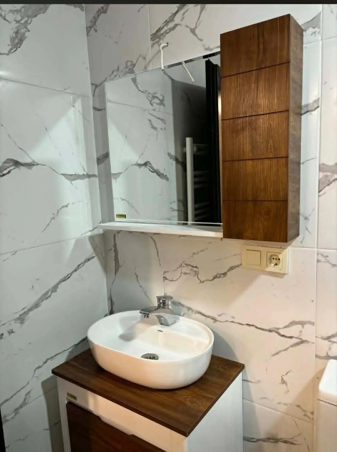 Modern marble en-suite bathroom at the Mestia guesthouse, Georgia