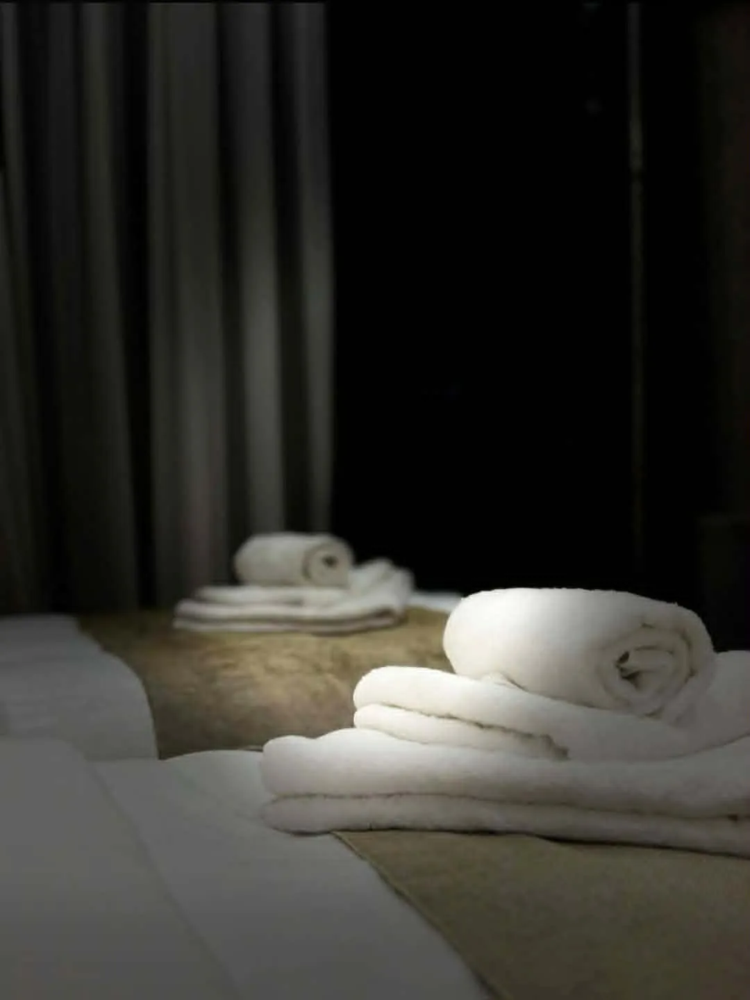 Fresh towels laid out on the bed at our guesthouse in Mestia, Svaneti, Georgia