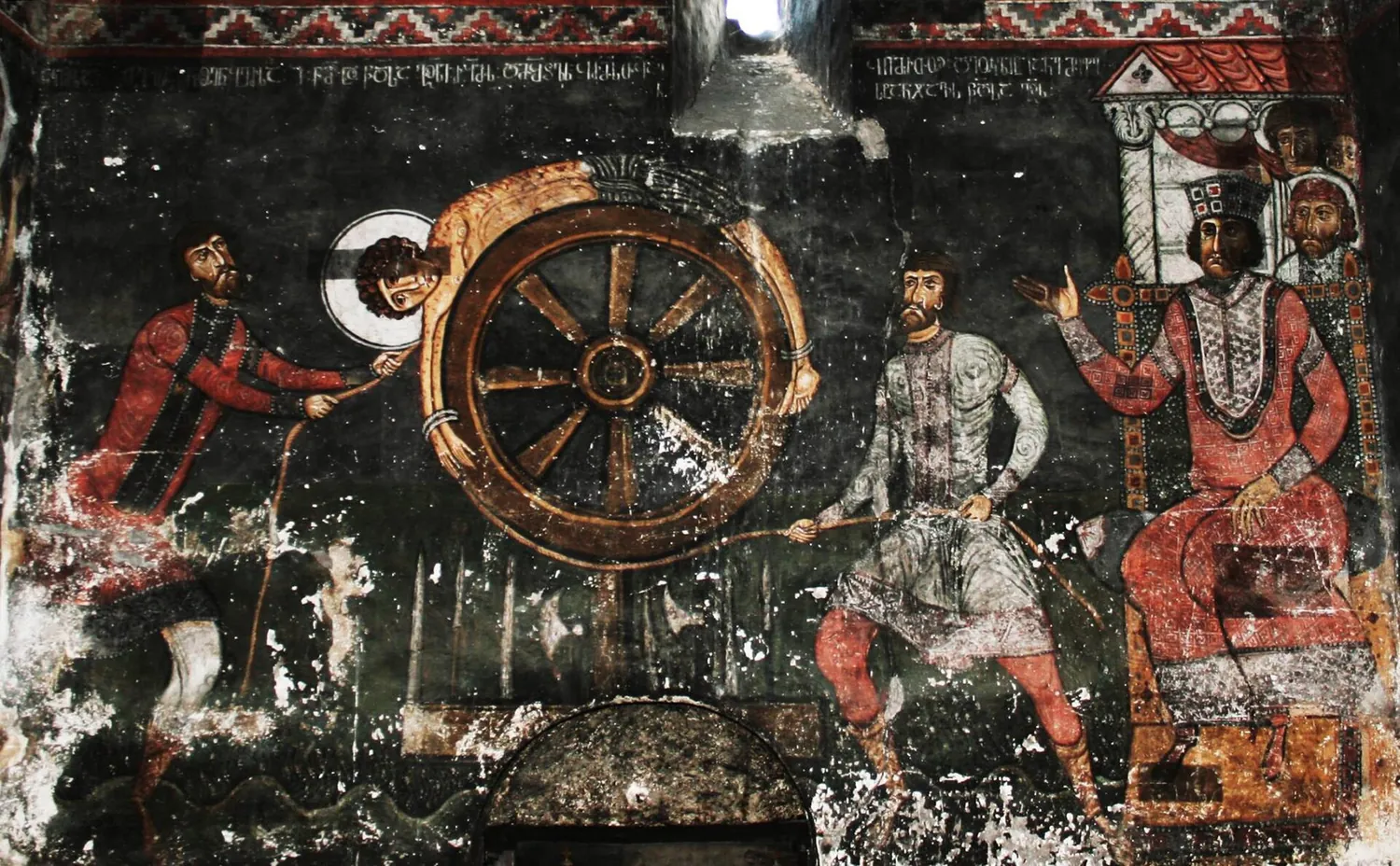 Medieval fresco of St George tortured on a wheel, painted in 1130 in the church of Nakipari, Svaneti, Georgia