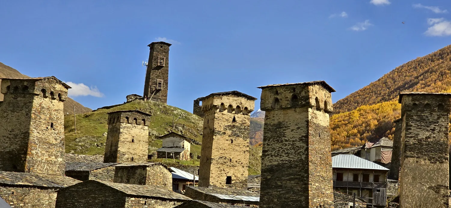 Svan towers in Ushguli in autumn, Warm Svaneti tour, Georgia