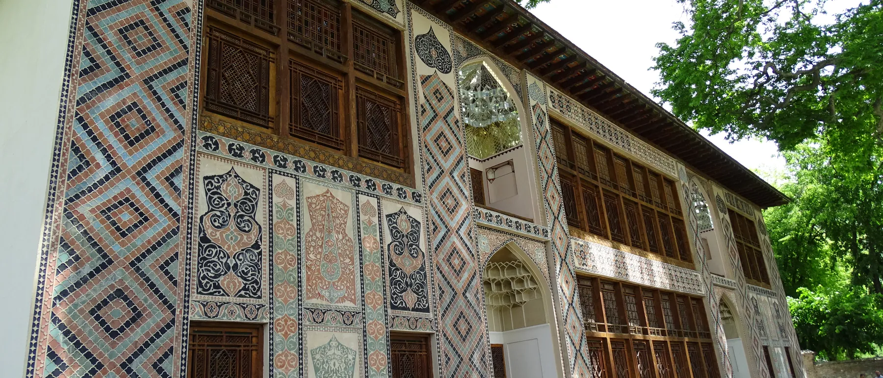 The decorated facade of the Khan's Palace in Sheki, Azerbaijan