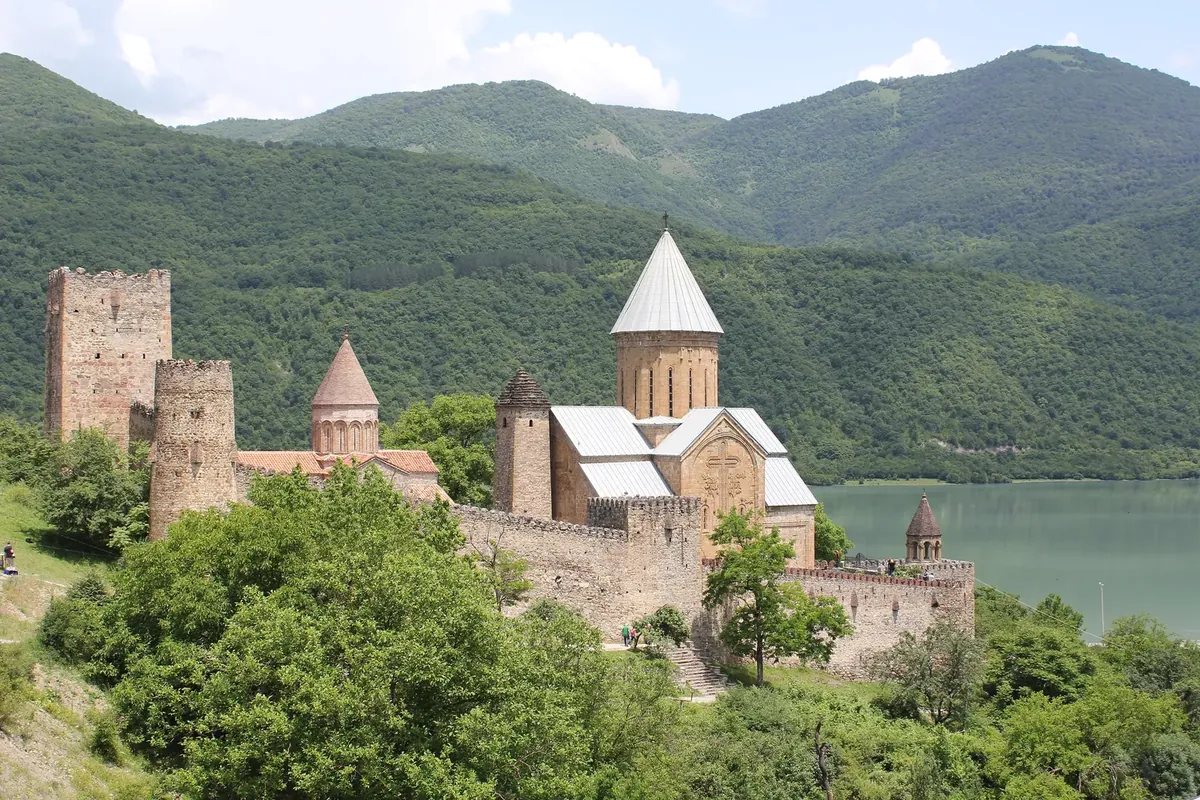 Ananuri fortress with its stone churches and towers above the turquoise Zhinvali reservoir on the Georgian Military Road